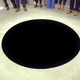 Illustration for article titled Museum Visitor Falls Into Giant Hole That Looks Like a Cartoonish Painting on the Floor